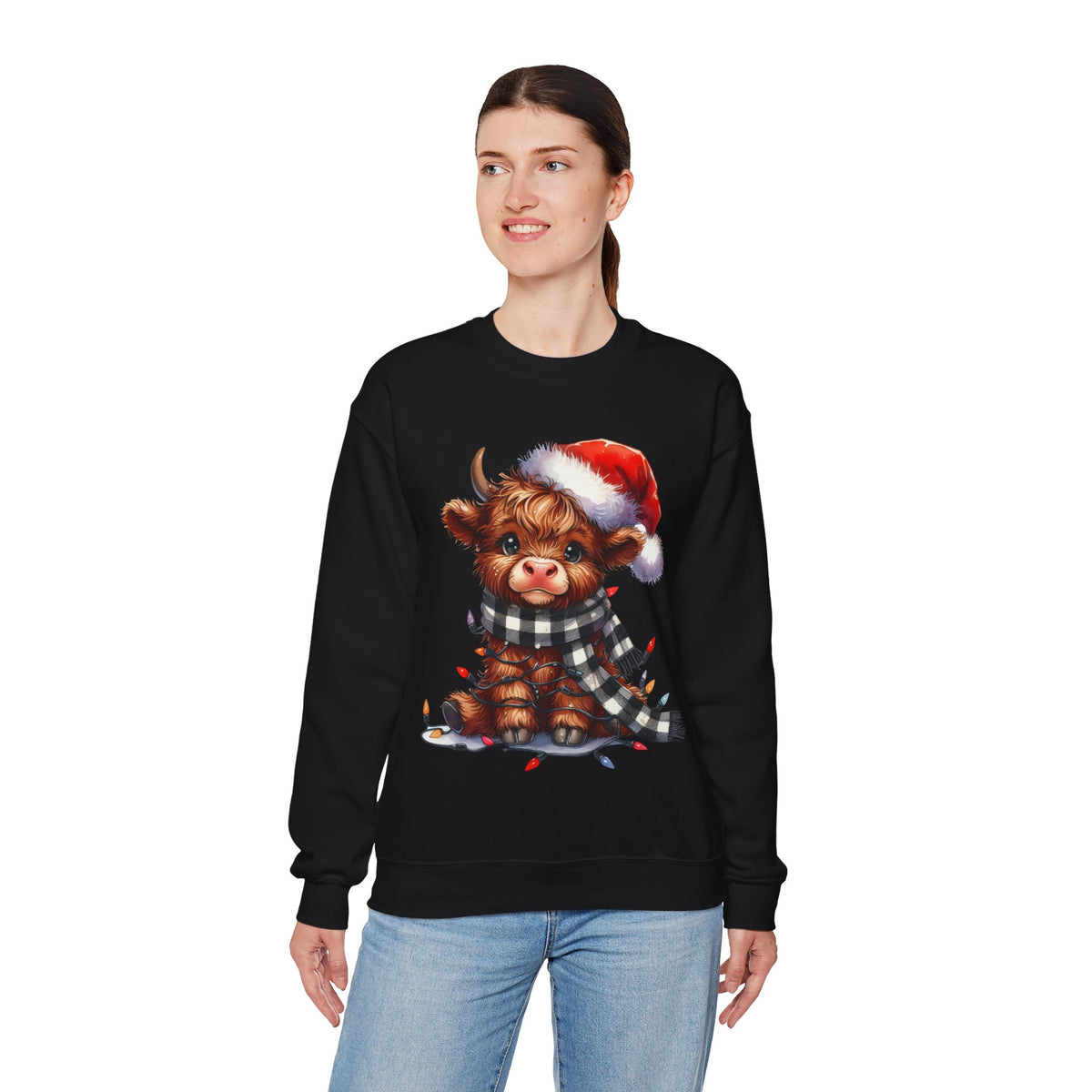 Cute Highland Cow Santa Hat Scarf Christmas Lights – Gildan Heavy Blend | Trendy Women’s Soft Sweatshirt. Direct to Garment. Printed & Shipped in the USA. Unisex Sizes.