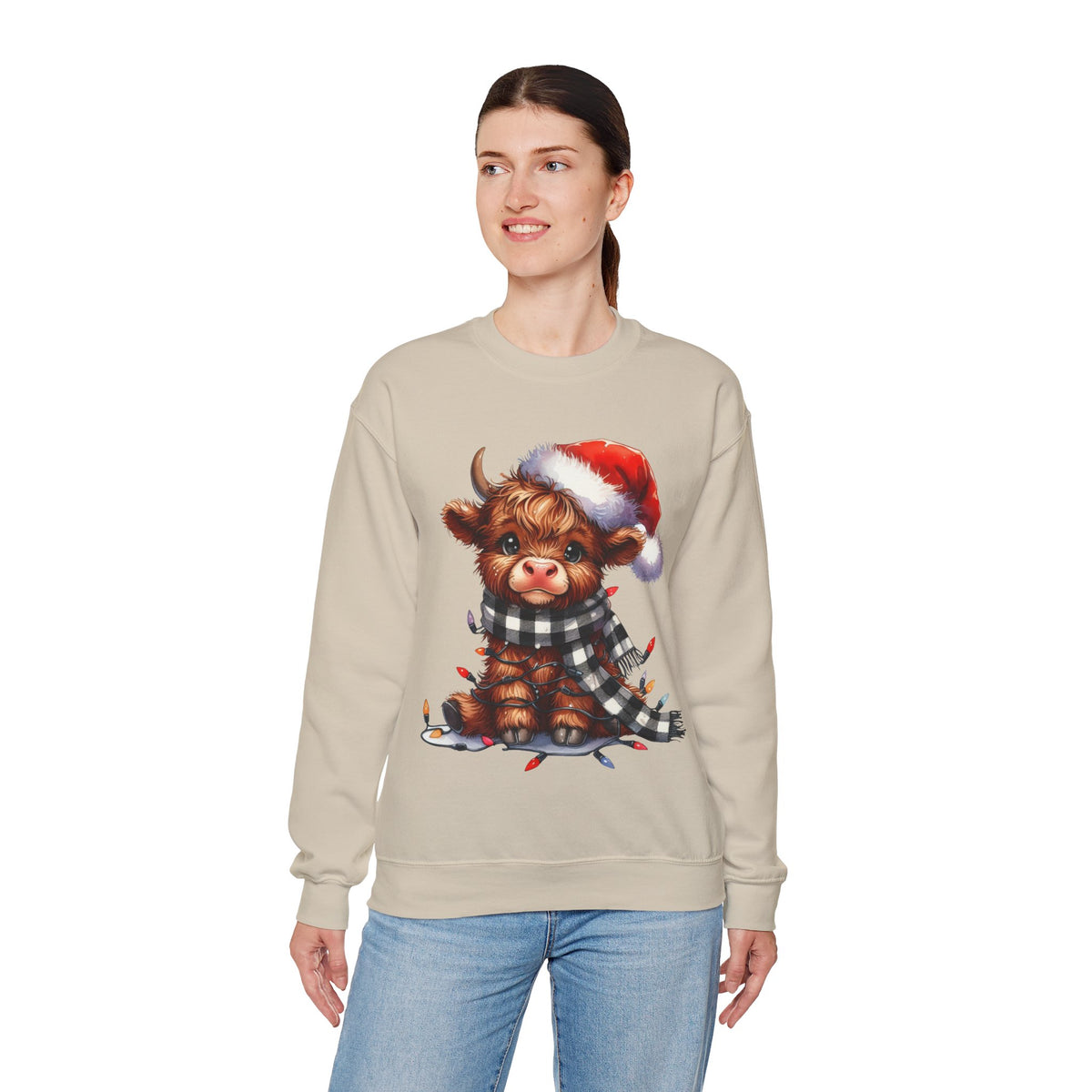 Cute Highland Cow Santa Hat Scarf Christmas Lights – Gildan Heavy Blend | Trendy Women’s Soft Sweatshirt. Direct to Garment. Printed & Shipped in the USA. Unisex Sizes.