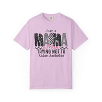 Just a Mama Out Here Trying Not To Raise Assholes - Comfort Colors | Trendy Women's T-Shirt. Direct to Garment. Printed & Shipped in the USA. Unisex Sizes.