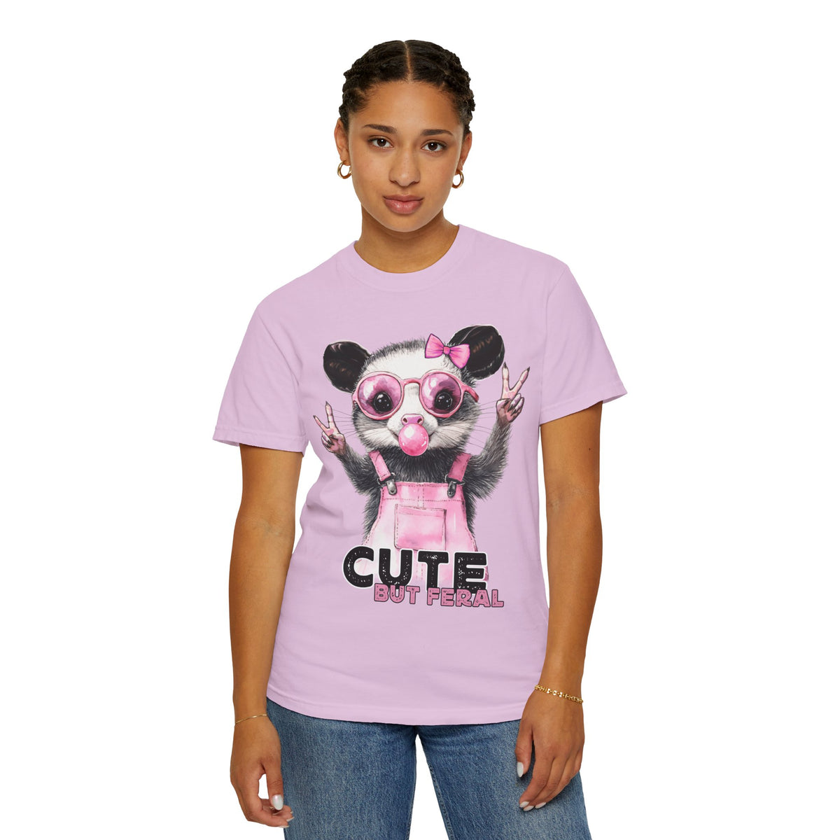 Cute But Feral, Possum in Pink Bibs - Comfort Colors | Trendy Women's T-Shirt. Direct to Garment. Printed & Shipped in the USA. Unisex Sizes.