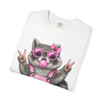 Cute But Feral, Raccoon in Pink Bibs - Comfort Colors | Trendy Women's T-Shirt. Direct to Garment. Printed & Shipped in the USA. Unisex Sizes.
