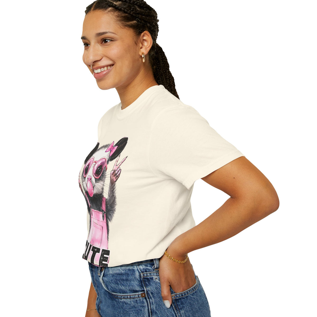 Cute But Feral, Possum in Pink Bibs - Comfort Colors | Trendy Women's T-Shirt. Direct to Garment. Printed & Shipped in the USA. Unisex Sizes.