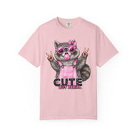 Cute But Feral, Raccoon in Pink Bibs - Comfort Colors | Trendy Women's T-Shirt. Direct to Garment. Printed & Shipped in the USA. Unisex Sizes.