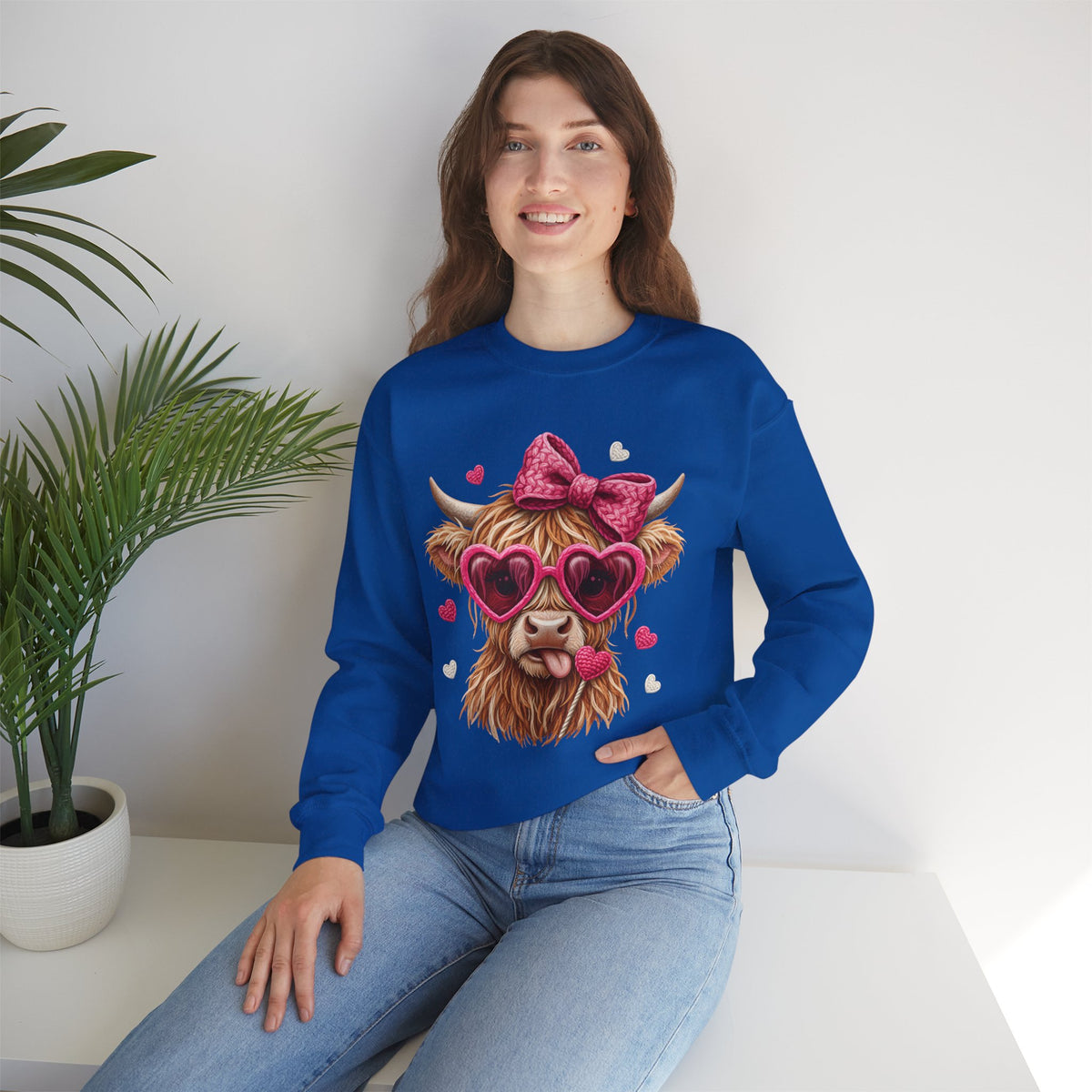 Highland Cow - Pink Heart Shaped Glasses – Gildan Heavy Blend | Trendy Women’s Soft Sweatshirt. Direct to Garment. Printed & Shipped in the USA. Unisex Sizes.