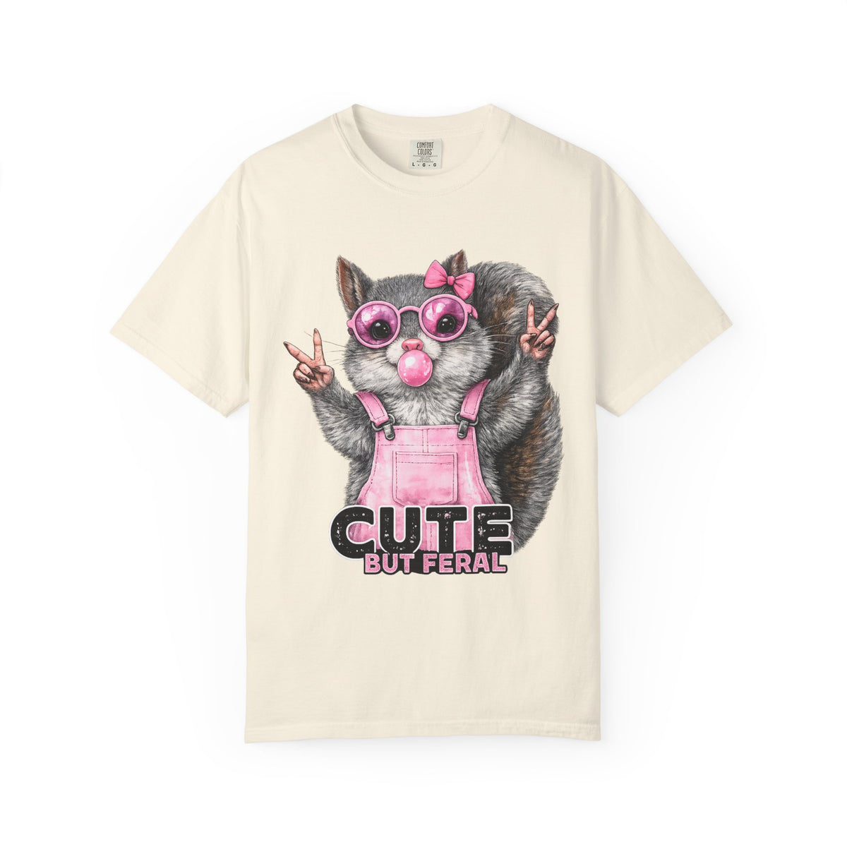 Cute But Feral, Squirrel in Pink Bibs - Comfort Colors | Trendy Women's T-Shirt. Direct to Garment. Printed & Shipped in the USA. Unisex Sizes.