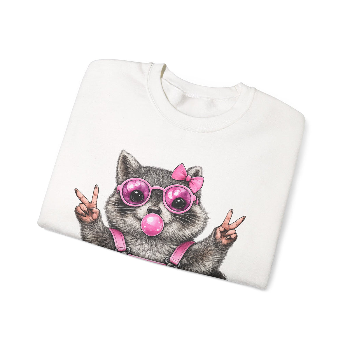Cute But Feral, Raccoon in Pink Bibs – Gildan Heavy Blend | Trendy Women’s Soft Sweatshirt. Direct to Garment. Printed & Shipped in the USA. Unisex Sizes.