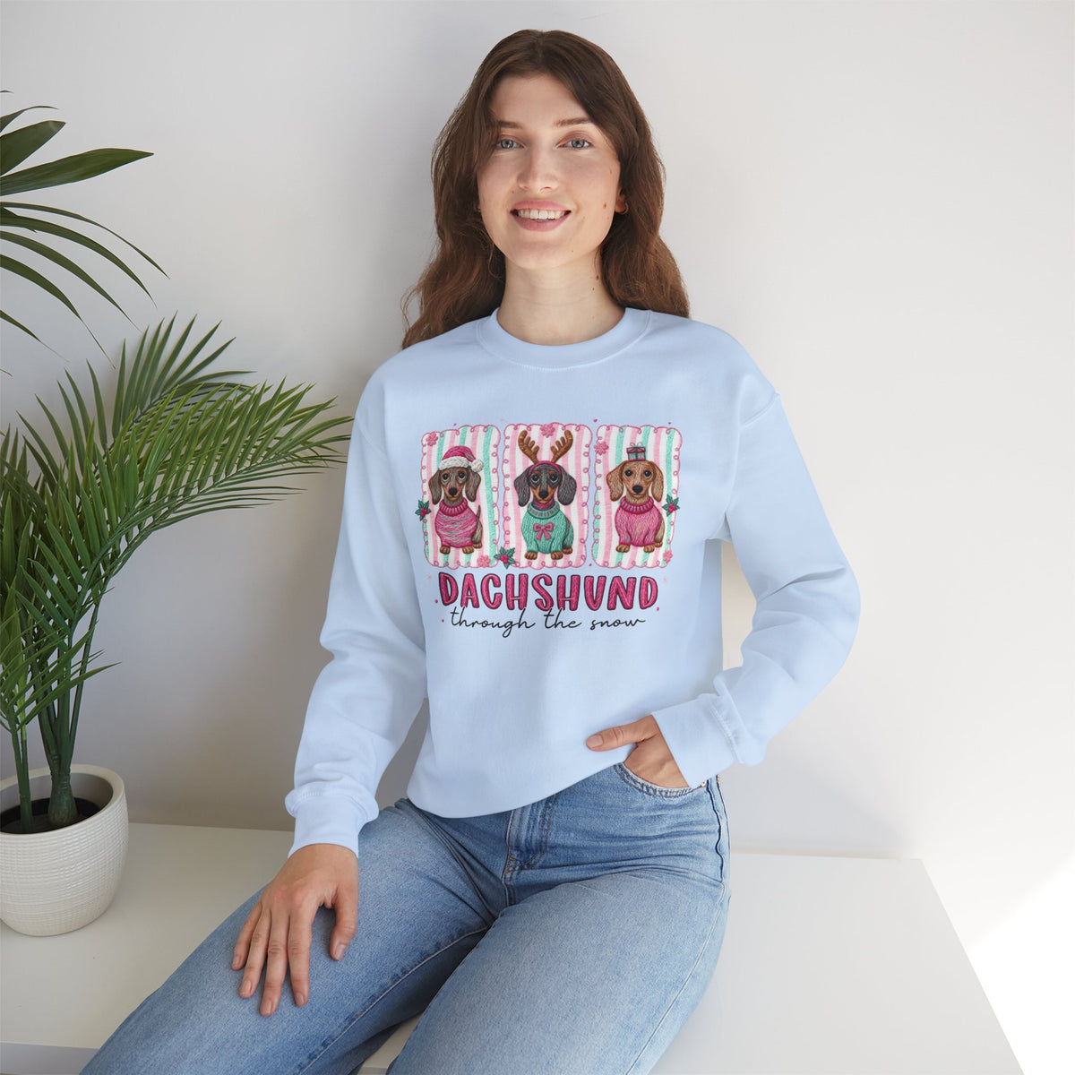 Dachshund Through the Snow – Gildan Heavy Blend | Trendy Women’s Soft Sweatshirt. Direct to Garment. Printed & Shipped in the USA. Unisex Sizes.
