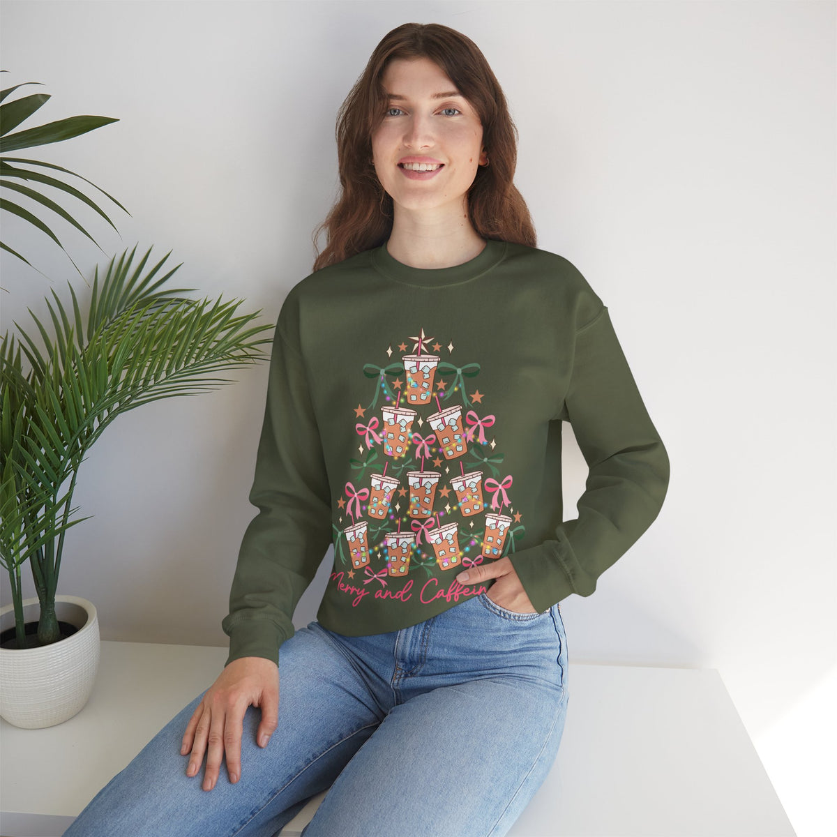 Merry and Caffeinated Iced Coffee Christmas Tree – Gildan Heavy Blend | Trendy Women’s Soft Sweatshirt. Direct to Garment. Printed & Shipped in the USA. Unisex Sizes.