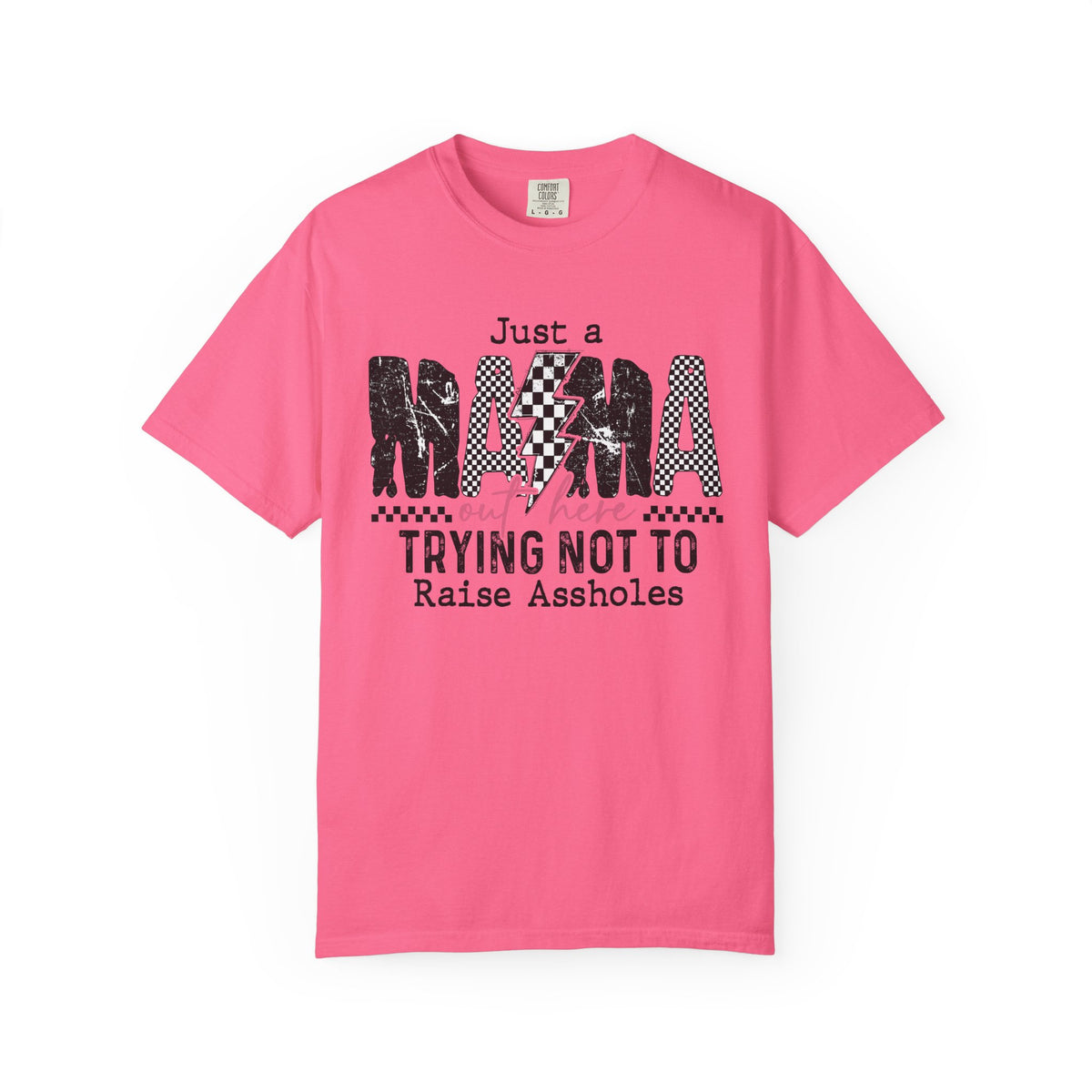 Just a Mama Out Here Trying Not To Raise Assholes - Comfort Colors | Trendy Women's T-Shirt. Direct to Garment. Printed & Shipped in the USA. Unisex Sizes.