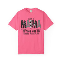 Just a Mama Out Here Trying Not To Raise Assholes - Comfort Colors | Trendy Women's T-Shirt. Direct to Garment. Printed & Shipped in the USA. Unisex Sizes.