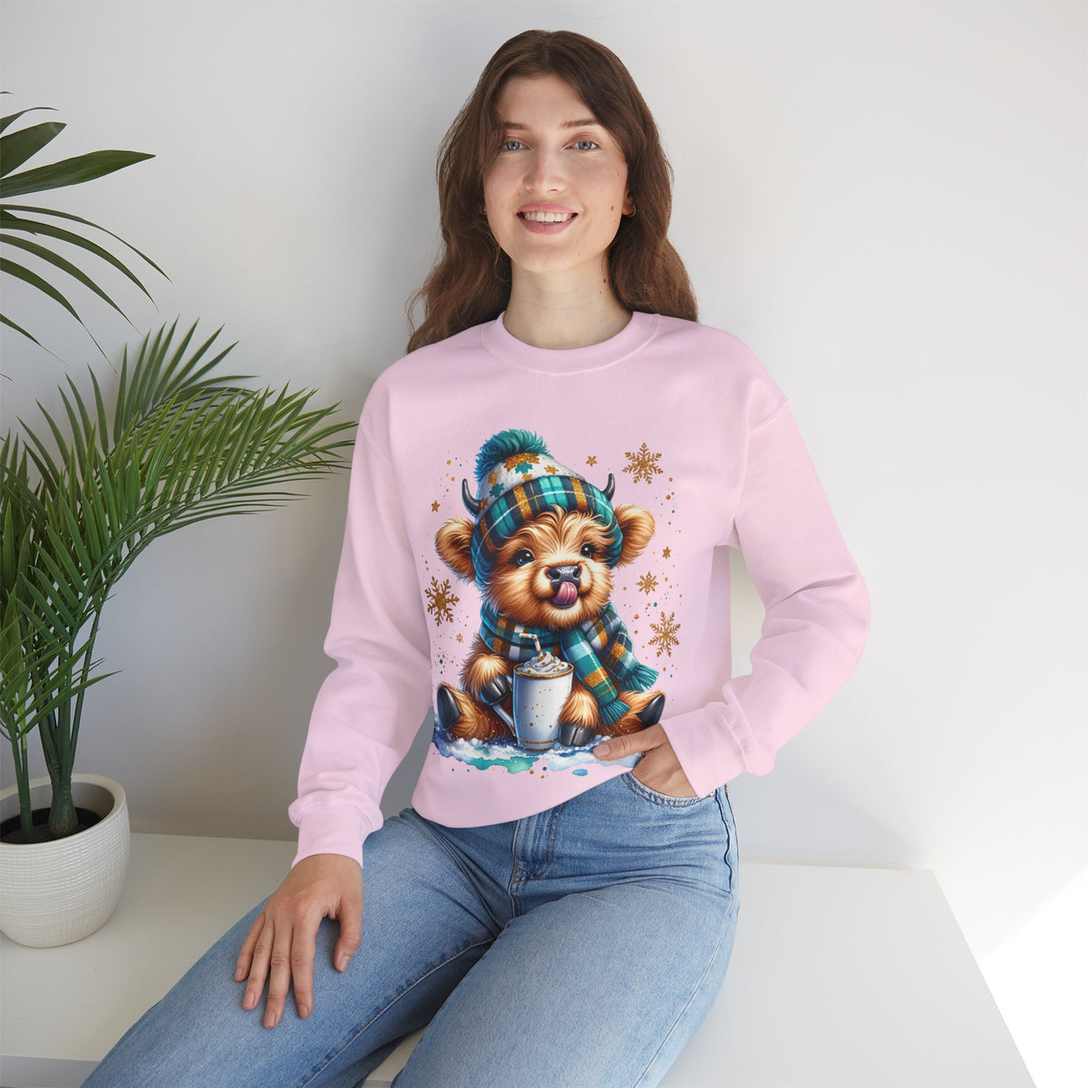 Winter Baby Highland Cow with Cocoa – Gildan Heavy Blend | Trendy Women’s Soft Sweatshirt. Direct to Garment. Printed & Shipped in the USA. Unisex Sizes.