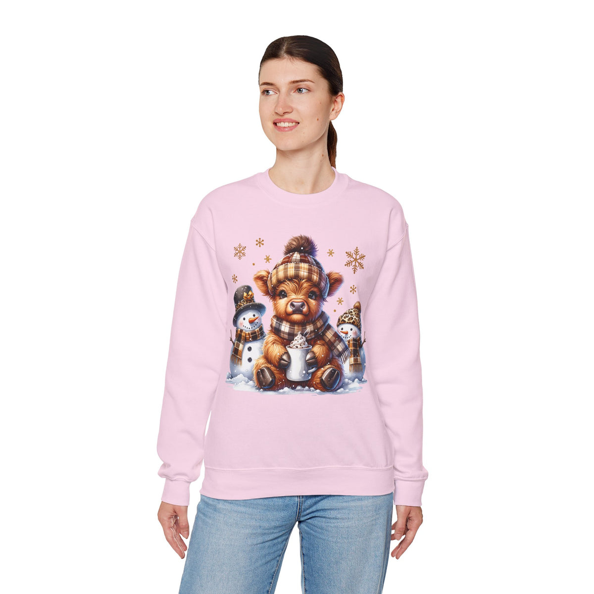Cute Highland Cow with Snowmen, Winter – Gildan Heavy Blend | Trendy Women’s Soft Sweatshirt. Direct to Garment. Printed & Shipped in the USA. Unisex Sizes.