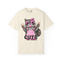 Cute But Feral, Raccoon in Pink Bibs - Comfort Colors | Trendy Women's T-Shirt. Direct to Garment. Printed & Shipped in the USA. Unisex Sizes.
