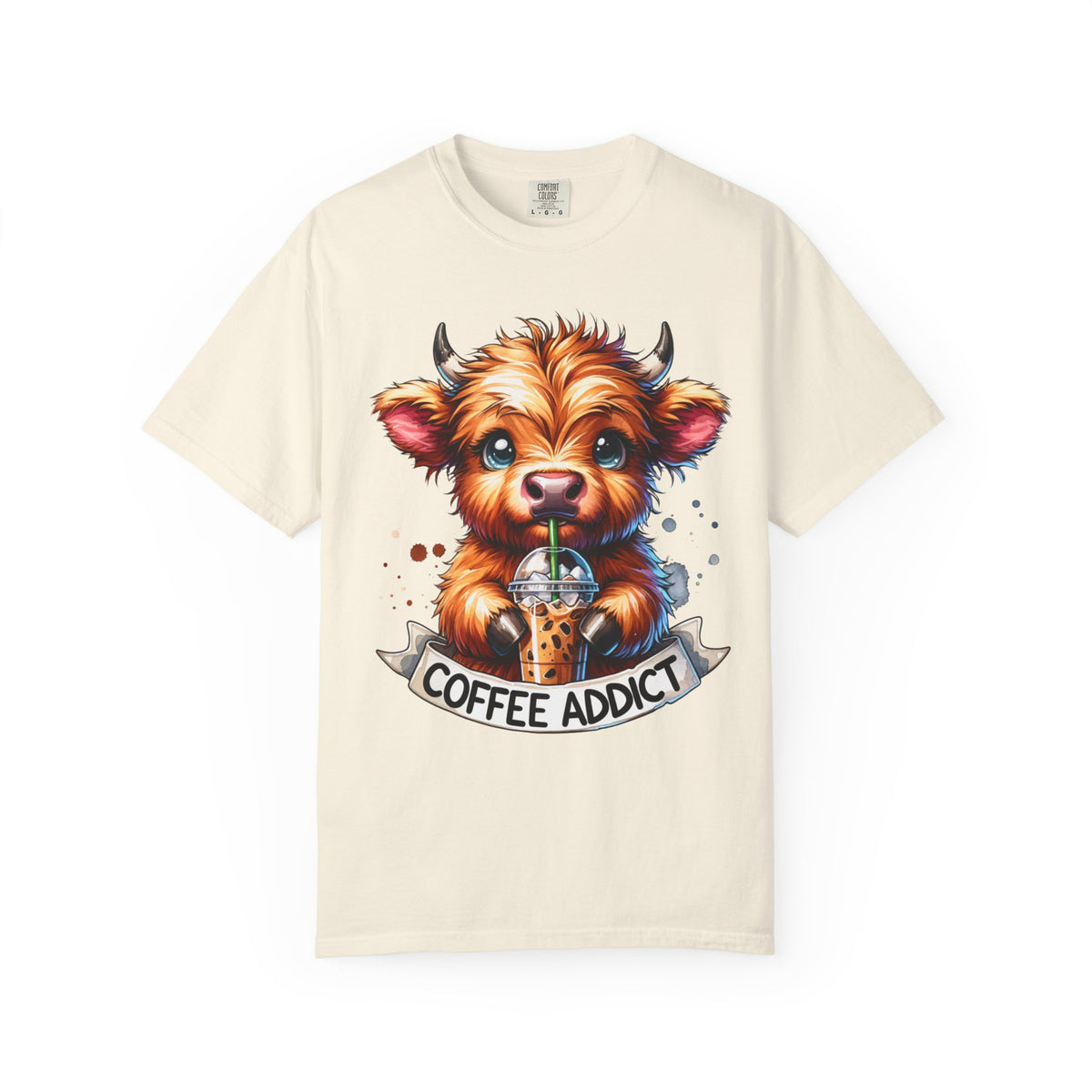 Coffee Addict Highland Cow Drinking Iced Coffee - Comfort Colors | Trendy Women's T-Shirt. Direct to Garment. Printed & Shipped in the USA. Unisex Sizes.