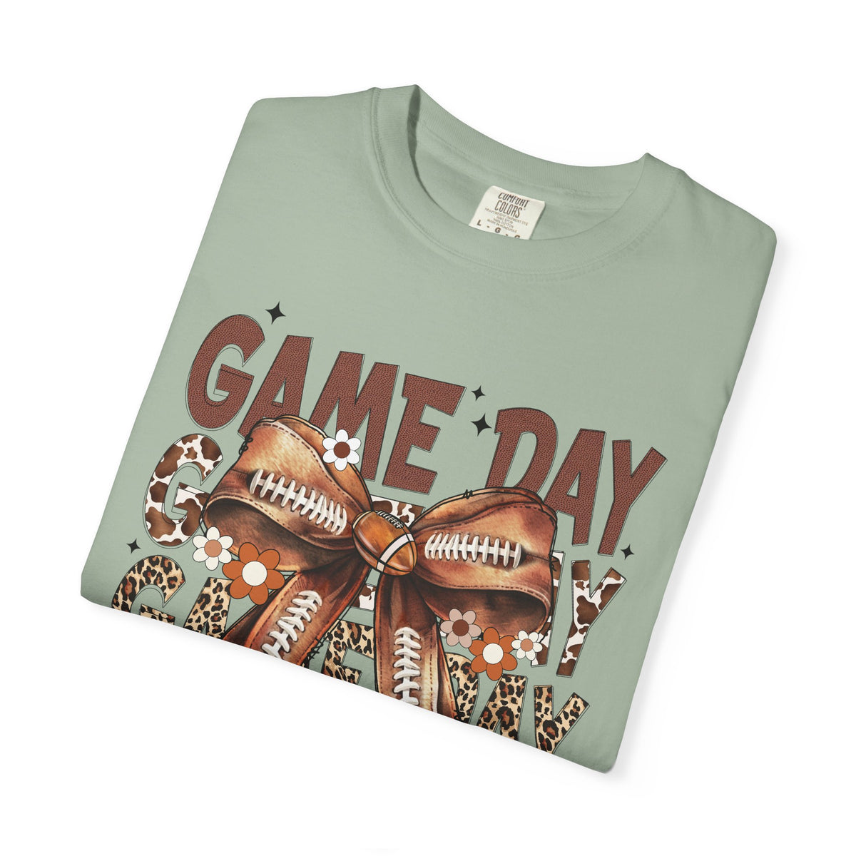 Game Day - Football Bow - Comfort Colors | Trendy Women's T-Shirt. Direct to Garment. Printed & Shipped in the USA. Unisex Sizes.