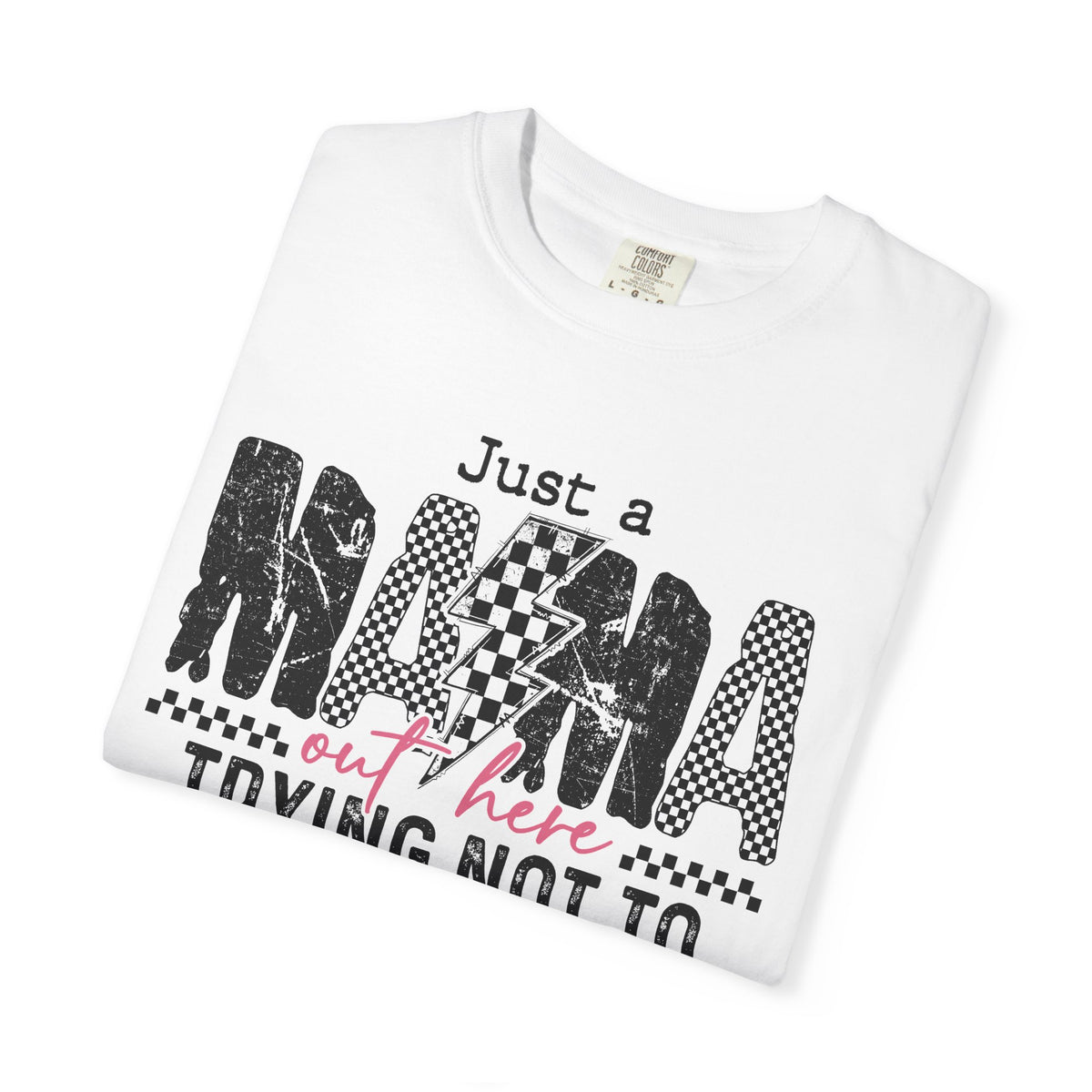 Just a Mama Out Here Trying Not To Raise Assholes - Comfort Colors | Trendy Women's T-Shirt. Direct to Garment. Printed & Shipped in the USA. Unisex Sizes.