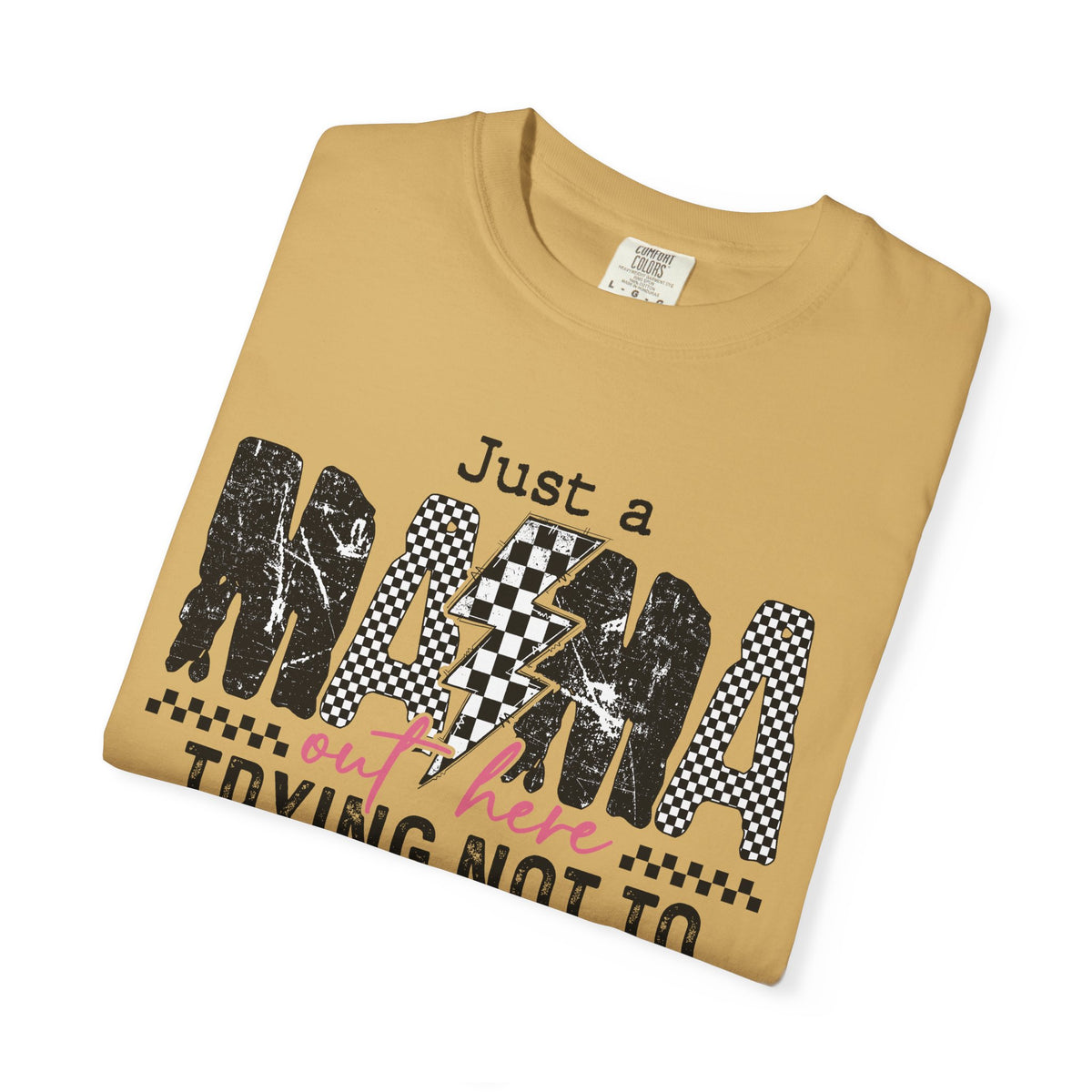 Just a Mama Out Here Trying Not To Raise Assholes - Comfort Colors | Trendy Women's T-Shirt. Direct to Garment. Printed & Shipped in the USA. Unisex Sizes.