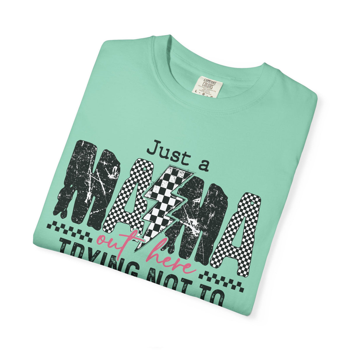 Just a Mama Out Here Trying Not To Raise Assholes - Comfort Colors | Trendy Women's T-Shirt. Direct to Garment. Printed & Shipped in the USA. Unisex Sizes.