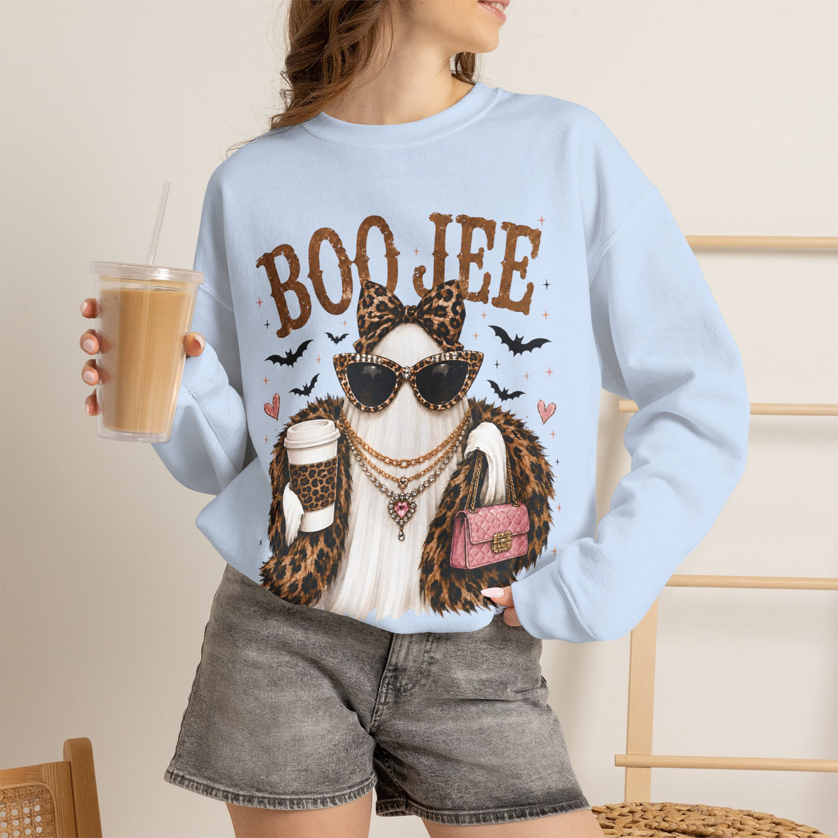 BooJee Ghost with Coffee - Halloween – Gildan Heavy Blend | Trendy Women’s Soft Sweatshirt. Direct to Garment. Printed & Shipped in the USA. Unisex Sizes.
