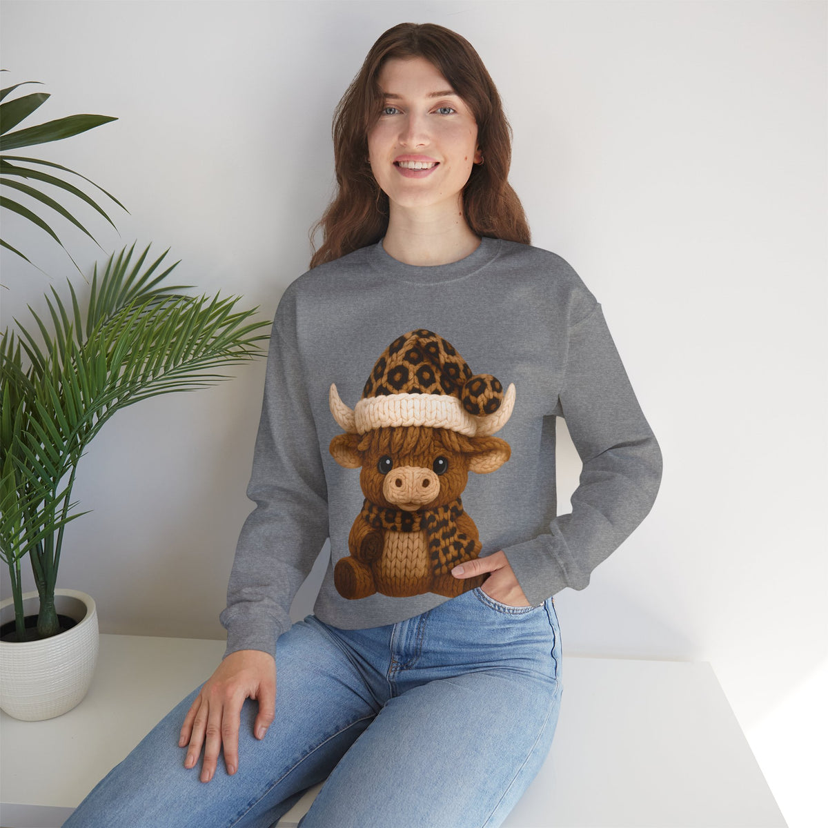 Cute Highland Cow with Leopard Santa Hat Christmas – Gildan Heavy Blend | Trendy Women’s Soft Sweatshirt. Direct to Garment. Printed & Shipped in the USA. Unisex Sizes.