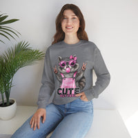 Cute But Feral, Raccoon in Pink Bibs – Gildan Heavy Blend | Trendy Women’s Soft Sweatshirt. Direct to Garment. Printed & Shipped in the USA. Unisex Sizes.