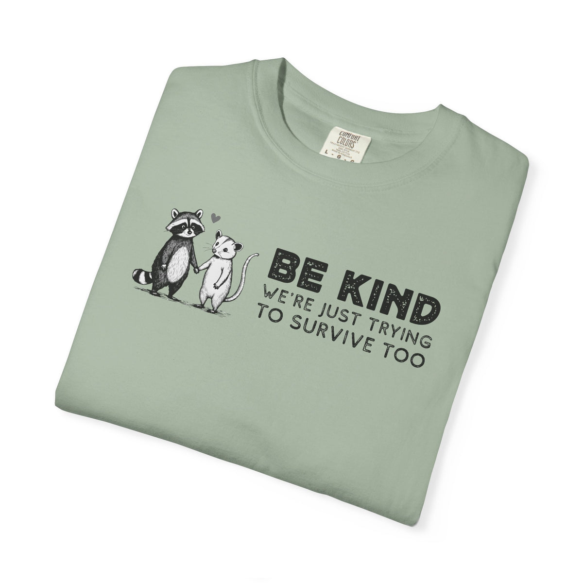Be Kind We're Just Trying To Survive Too - Possum Raccoon *This Shirt Saves Lives* - Comfort Colors | Trendy Unisex T-Shirt. Direct to Garment. Printed & Shipped in the USA. Unisex Sizes.
