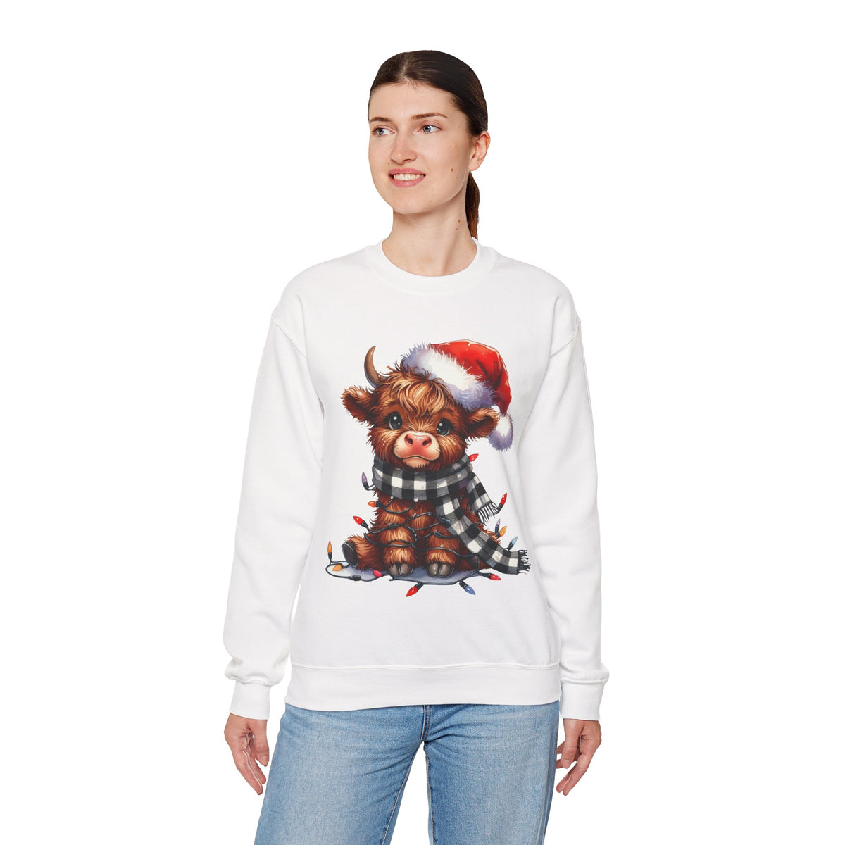 Cute Highland Cow Santa Hat Scarf Christmas Lights – Gildan Heavy Blend | Trendy Women’s Soft Sweatshirt. Direct to Garment. Printed & Shipped in the USA. Unisex Sizes.