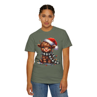 Cute Highland Cow Santa Hat Scarf Christmas Lights - Comfort Colors | Trendy Unisex T-Shirt. Direct to Garment. Printed & Shipped in the USA. Unisex Sizes.
