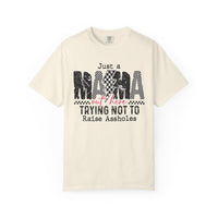 Just a Mama Out Here Trying Not To Raise Assholes - Comfort Colors | Trendy Women's T-Shirt. Direct to Garment. Printed & Shipped in the USA. Unisex Sizes.