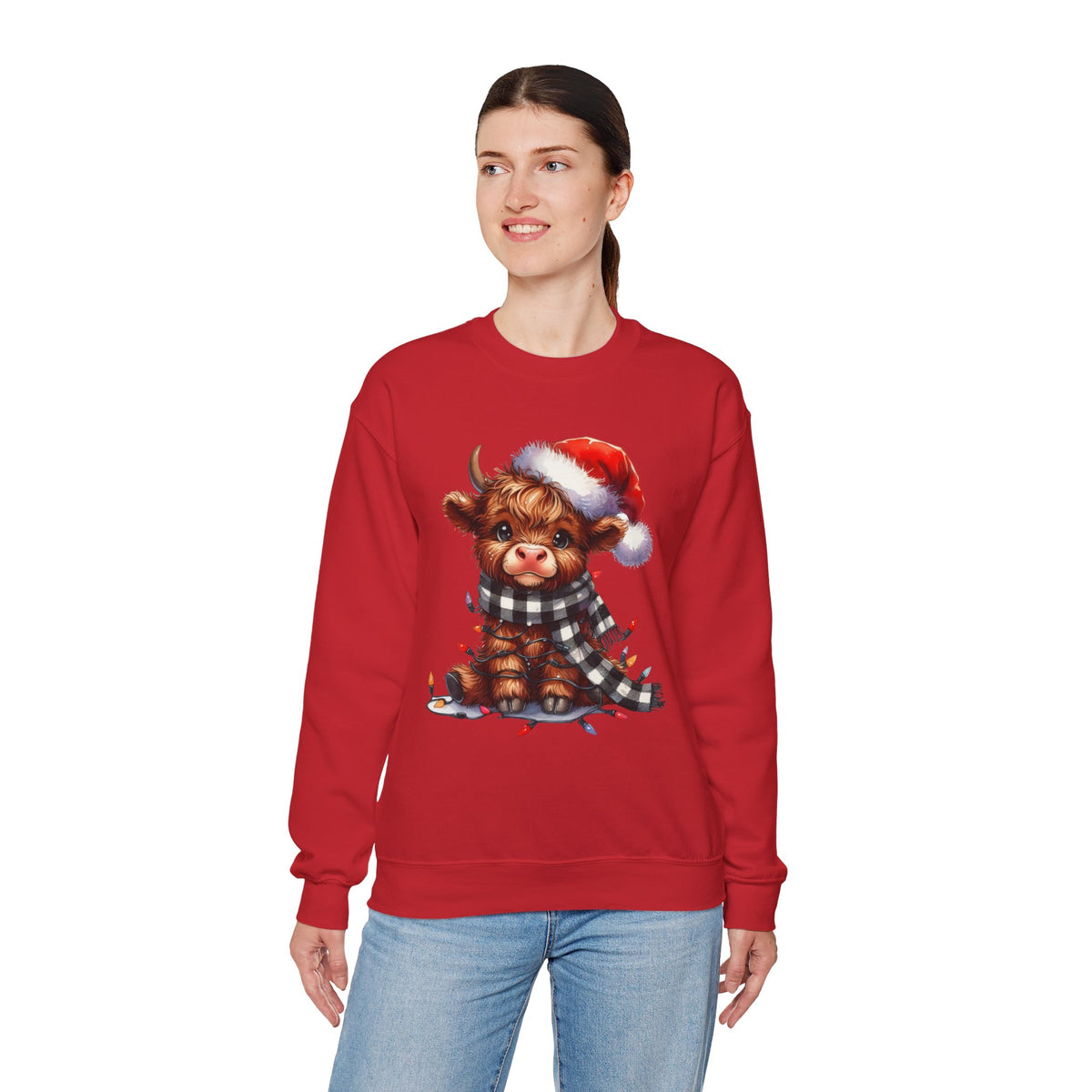 Cute Highland Cow Santa Hat Scarf Christmas Lights – Gildan Heavy Blend | Trendy Women’s Soft Sweatshirt. Direct to Garment. Printed & Shipped in the USA. Unisex Sizes.