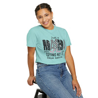 Just a Mama Out Here Trying Not To Raise Assholes - Comfort Colors | Trendy Women's T-Shirt. Direct to Garment. Printed & Shipped in the USA. Unisex Sizes.