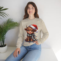 Cute Highland Cow Santa Hat Scarf Christmas Lights – Gildan Heavy Blend | Trendy Women’s Soft Sweatshirt. Direct to Garment. Printed & Shipped in the USA. Unisex Sizes.