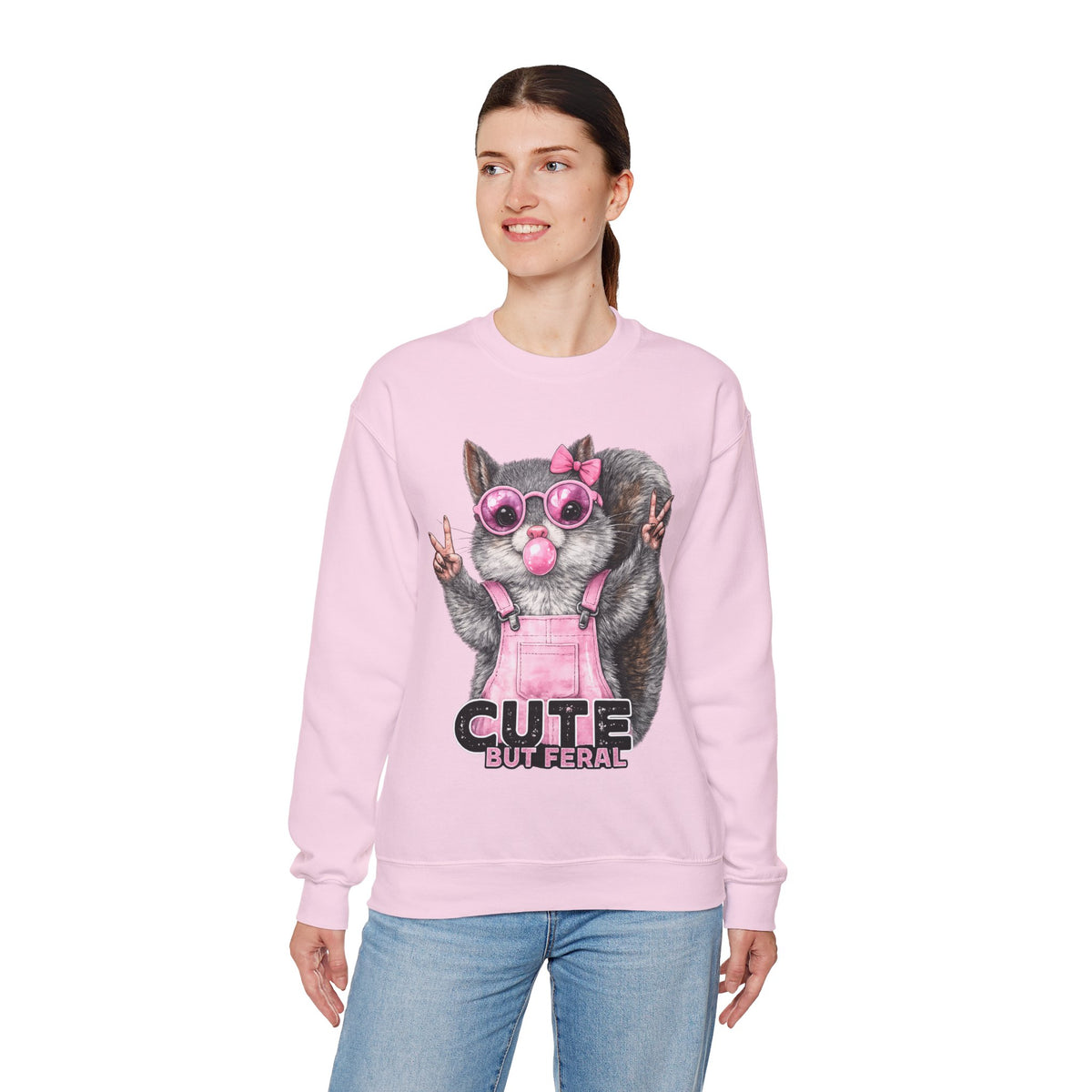 Cute But Feral, Squirrel in Pink Bibs – Gildan Heavy Blend | Trendy Women’s Soft Sweatshirt. Direct to Garment. Printed & Shipped in the USA. Unisex Sizes.