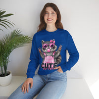 Cute But Feral, Raccoon in Pink Bibs – Gildan Heavy Blend | Trendy Women’s Soft Sweatshirt. Direct to Garment. Printed & Shipped in the USA. Unisex Sizes.