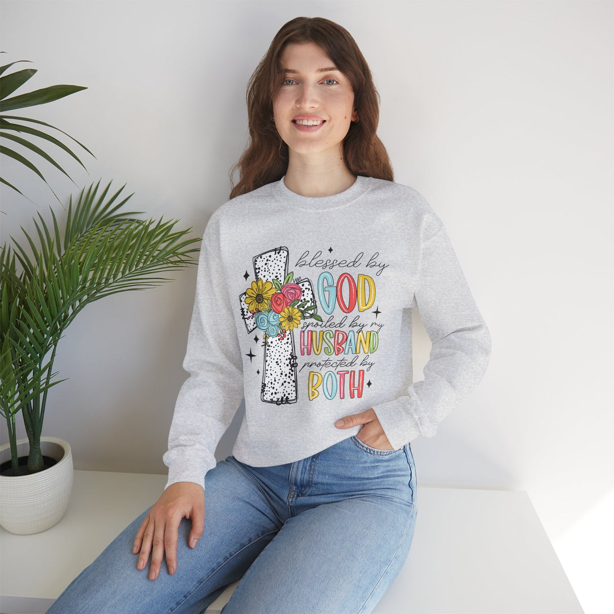 Blessed By God, Spoiled By My Husband, Protected By Both – Gildan Heavy Blend | Trendy Women’s Soft Sweatshirt. Direct to Garment. Printed & Shipped in the USA. Unisex Sizes.