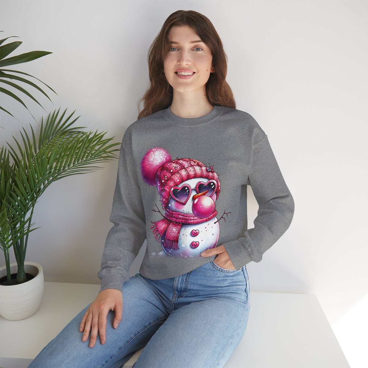 Pink Girly Snowman with Heart Sunglasses and Bubblegum - Winter – Gildan Heavy Blend | Trendy Women’s Soft Sweatshirt. Direct to Garment. Printed & Shipped in the USA. Unisex Sizes.
