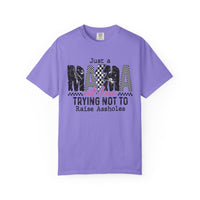 Just a Mama Out Here Trying Not To Raise Assholes - Comfort Colors | Trendy Women's T-Shirt. Direct to Garment. Printed & Shipped in the USA. Unisex Sizes.