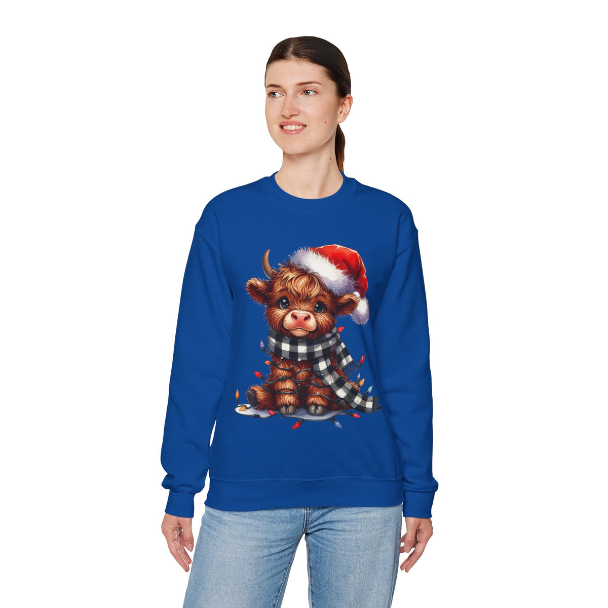 Cute Highland Cow Santa Hat Scarf Christmas Lights – Gildan Heavy Blend | Trendy Women’s Soft Sweatshirt. Direct to Garment. Printed & Shipped in the USA. Unisex Sizes.