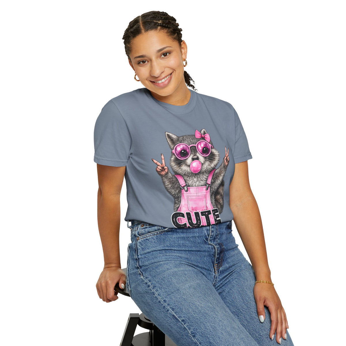 Cute But Feral, Raccoon in Pink Bibs - Comfort Colors | Trendy Women's T-Shirt. Direct to Garment. Printed & Shipped in the USA. Unisex Sizes.