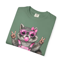 Cute But Feral, Raccoon in Pink Bibs - Comfort Colors | Trendy Women's T-Shirt. Direct to Garment. Printed & Shipped in the USA. Unisex Sizes.