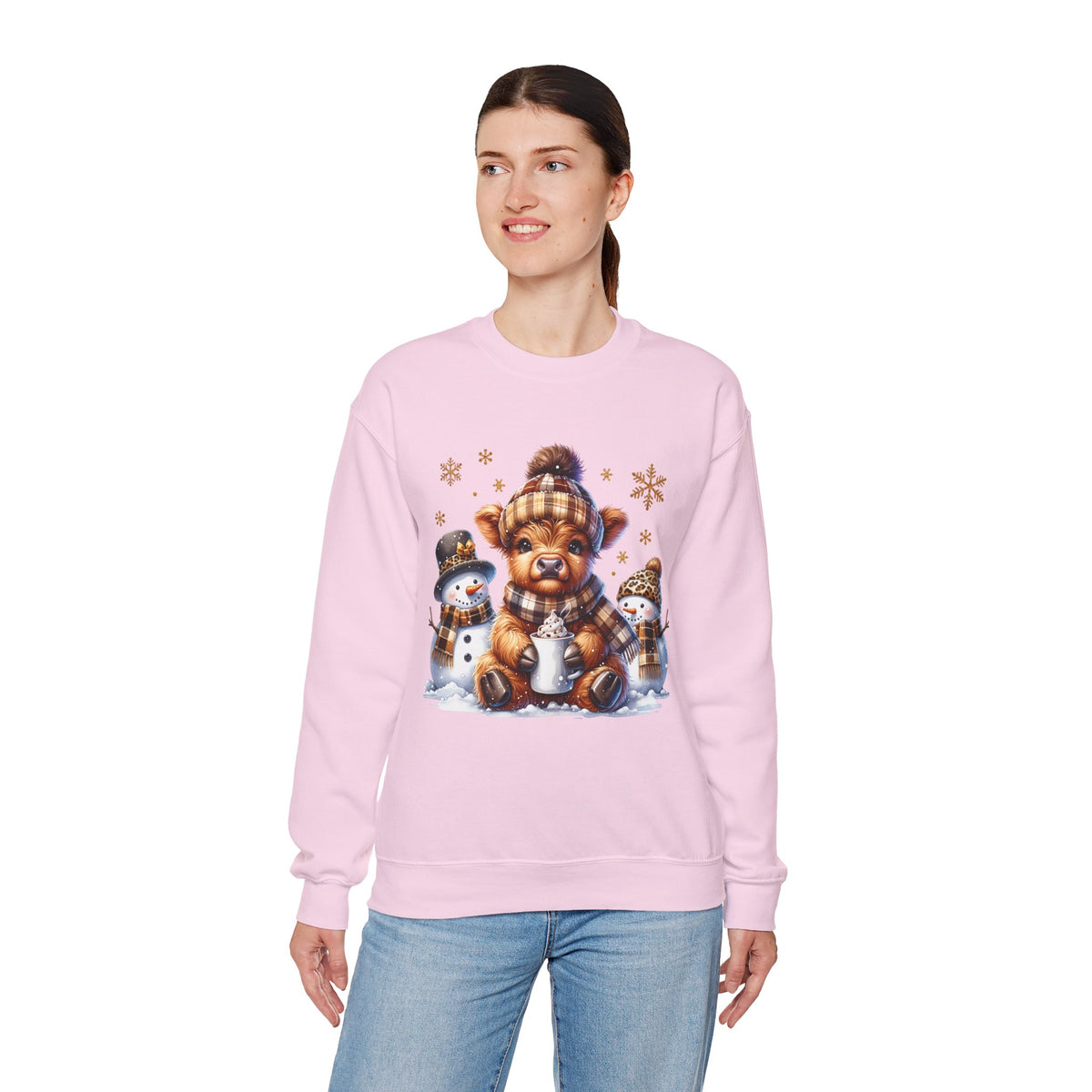 Cute Highland Cow with Snowmen, Winter – Gildan Heavy Blend | Trendy Women’s Soft Sweatshirt. Direct to Garment. Printed & Shipped in the USA. Unisex Sizes.