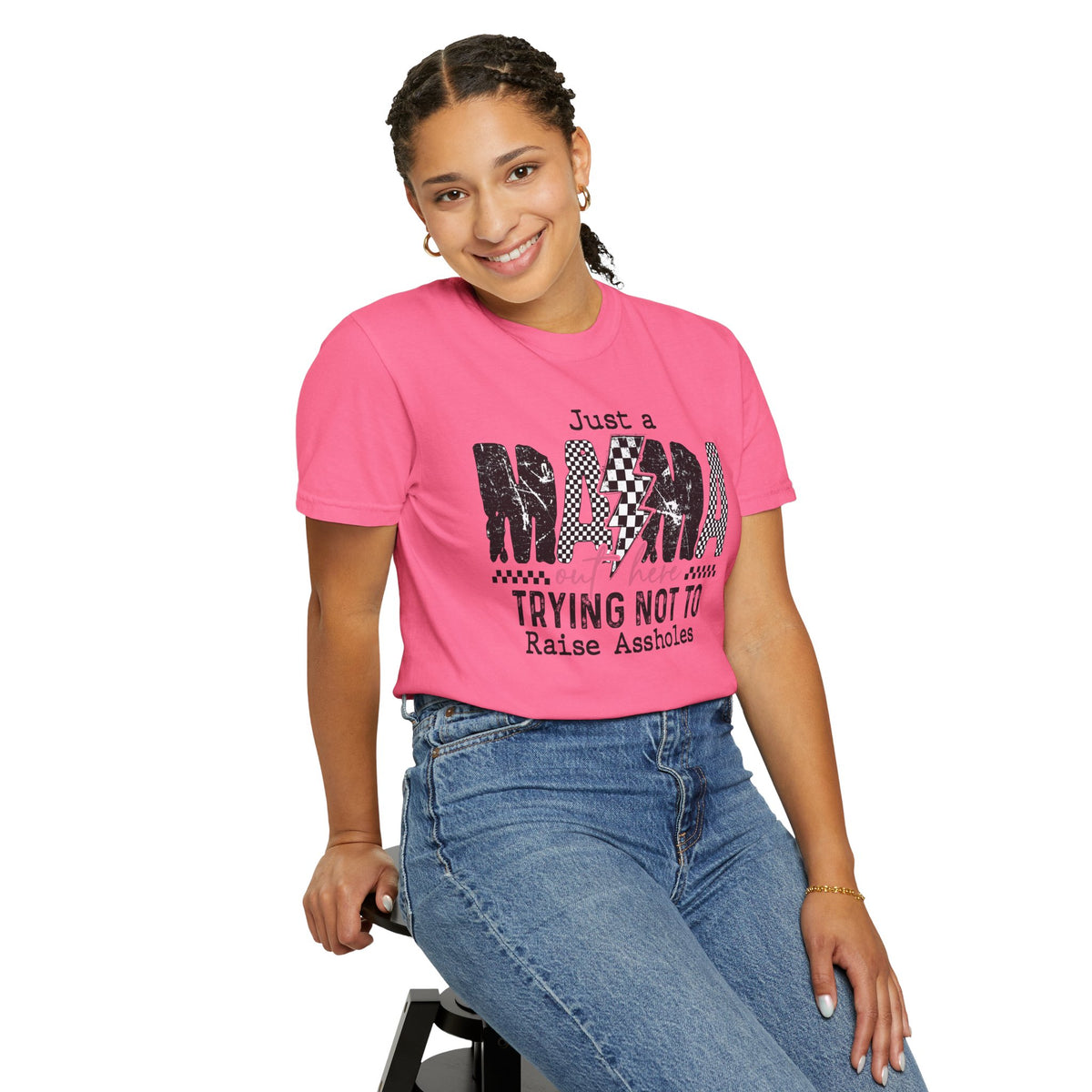 Just a Mama Out Here Trying Not To Raise Assholes - Comfort Colors | Trendy Women's T-Shirt. Direct to Garment. Printed & Shipped in the USA. Unisex Sizes.