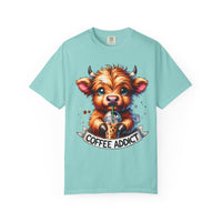 Coffee Addict Highland Cow Drinking Iced Coffee - Comfort Colors | Trendy Women's T-Shirt. Direct to Garment. Printed & Shipped in the USA. Unisex Sizes.