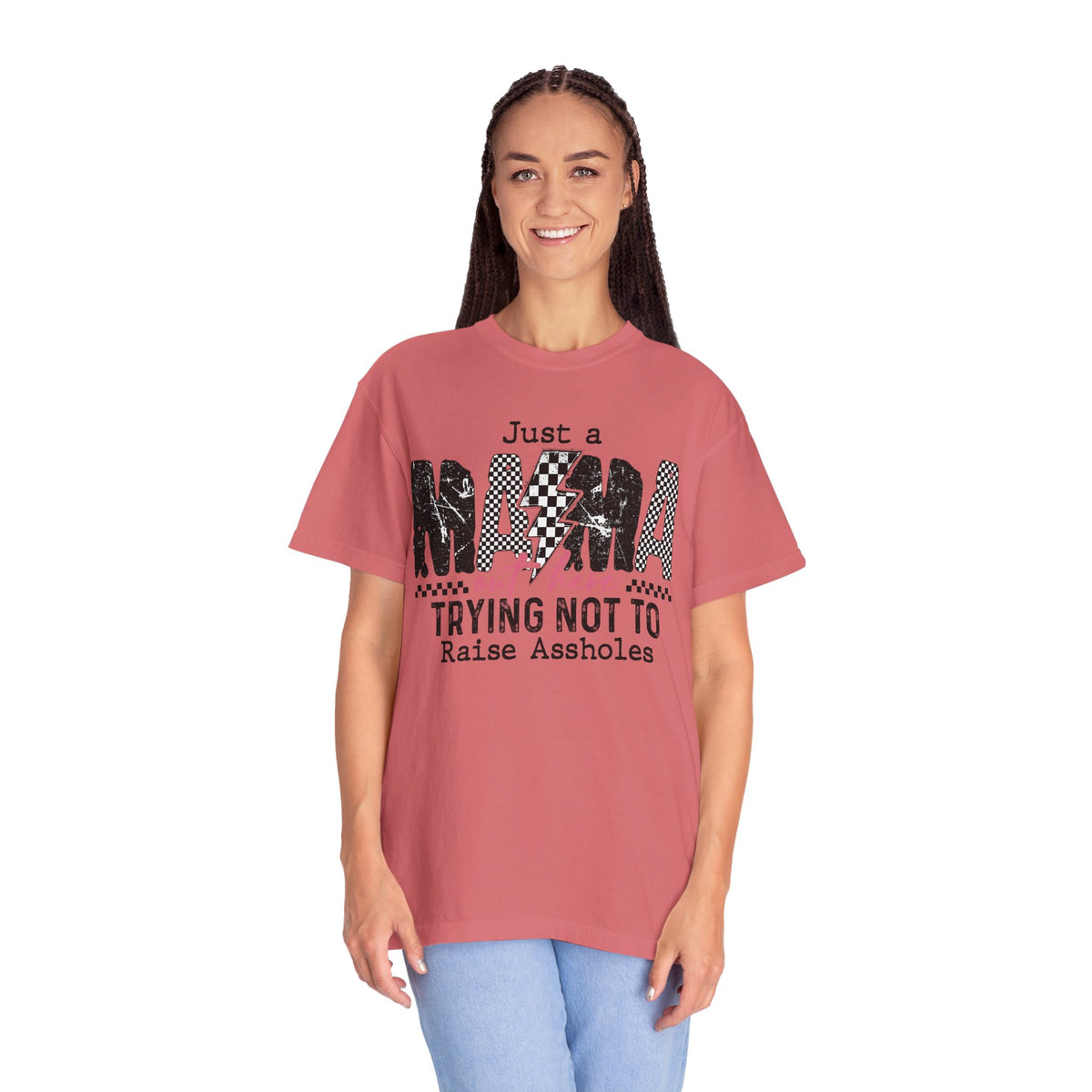 Just a Mama Out Here Trying Not To Raise Assholes - Comfort Colors | Trendy Women's T-Shirt. Direct to Garment. Printed & Shipped in the USA. Unisex Sizes.