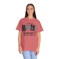 Just a Mama Out Here Trying Not To Raise Assholes - Comfort Colors | Trendy Women's T-Shirt. Direct to Garment. Printed & Shipped in the USA. Unisex Sizes.