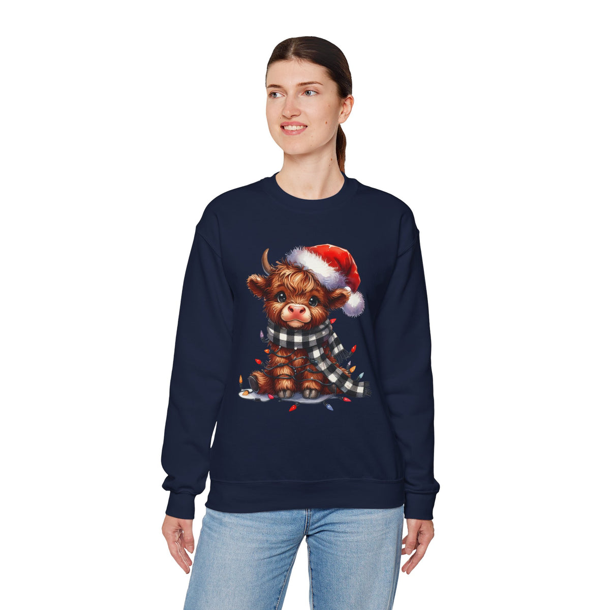 Cute Highland Cow Santa Hat Scarf Christmas Lights – Gildan Heavy Blend | Trendy Women’s Soft Sweatshirt. Direct to Garment. Printed & Shipped in the USA. Unisex Sizes.