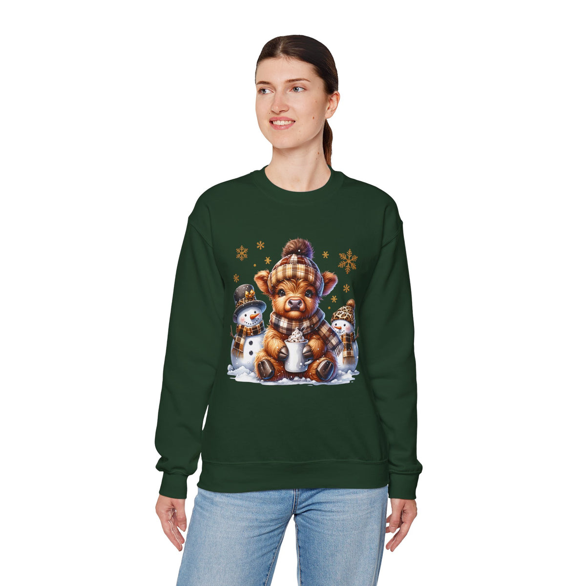 Cute Highland Cow with Snowmen, Winter – Gildan Heavy Blend | Trendy Women’s Soft Sweatshirt. Direct to Garment. Printed & Shipped in the USA. Unisex Sizes.