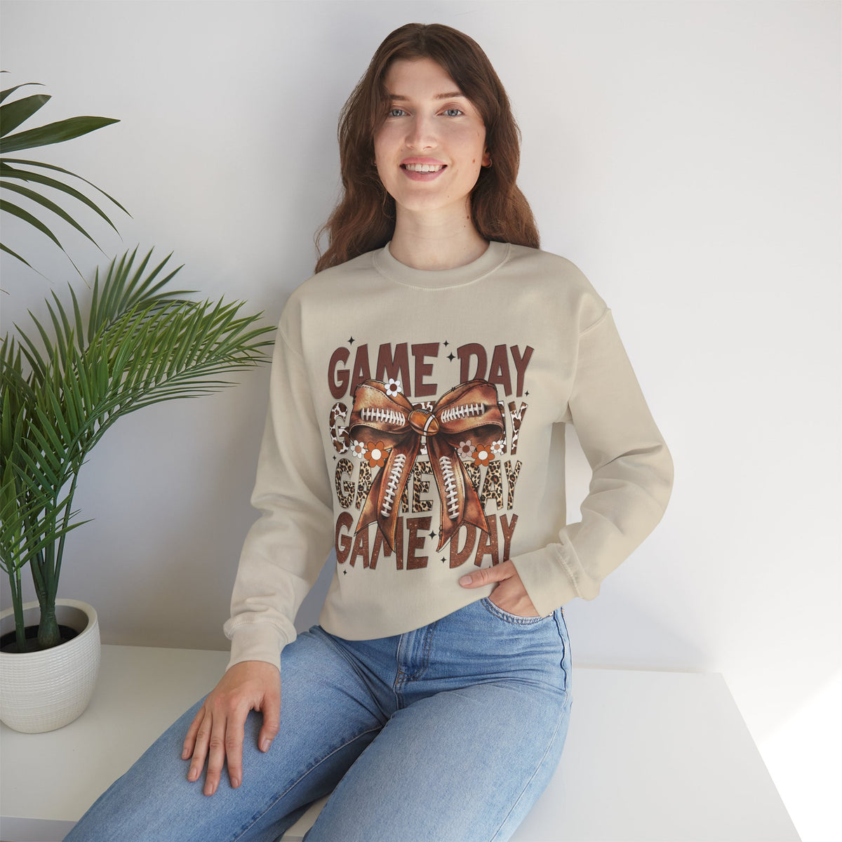 Game Day - Football Bow – Gildan Heavy Blend | Trendy Women’s Soft Sweatshirt. Direct to Garment. Printed & Shipped in the USA. Unisex Sizes.