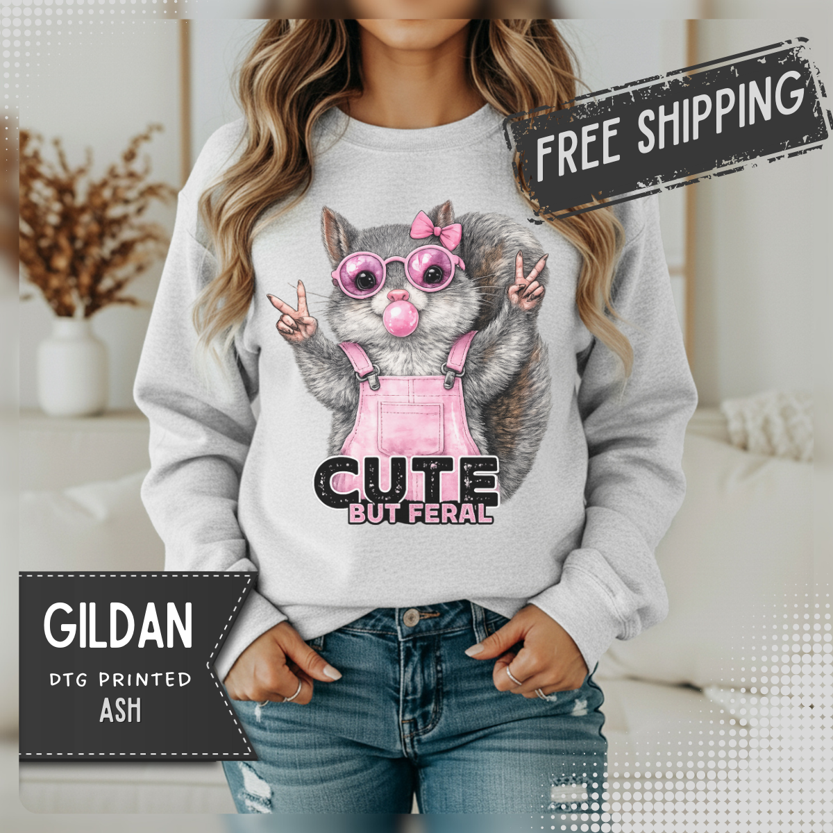 Cute But Feral, Squirrel in Pink Bibs – Gildan Heavy Blend | Trendy Women’s Soft Sweatshirt. Direct to Garment. Printed & Shipped in the USA. Unisex Sizes.
