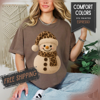 Cute Leopard Faux Knit Snowman Winter - Comfort Colors | Trendy Women's T-Shirt. Direct to Garment. Printed & Shipped in the USA. Unisex Sizes.